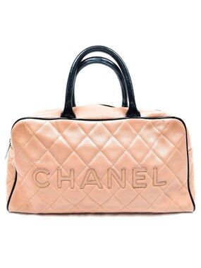 CHANEL Quilted Bowling Tote in Peach with Black Handles